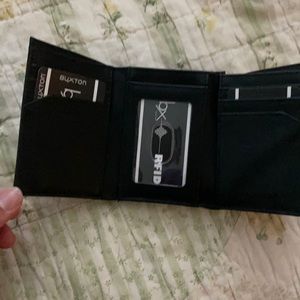 Black tri-fold wallet